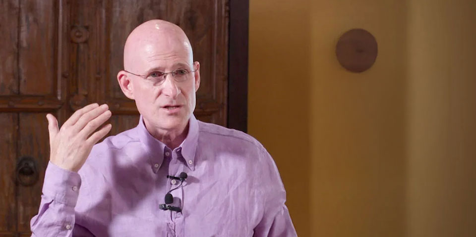 Dr. Brad Rachman giving a public address